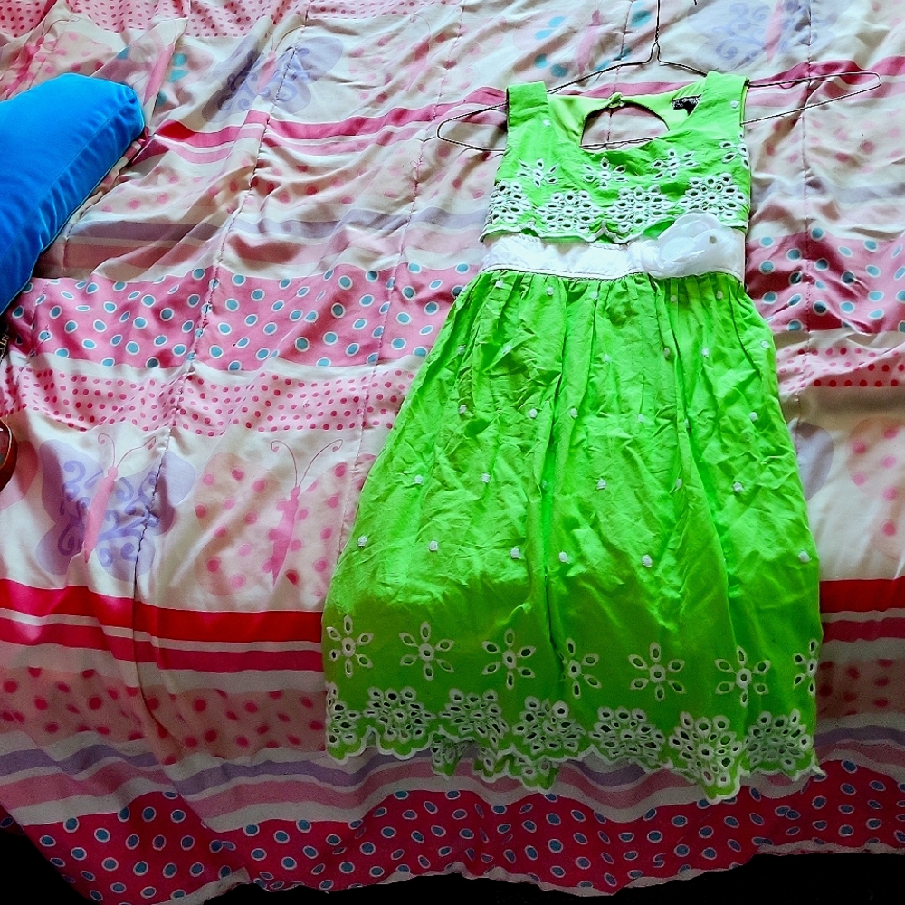 This a green Sequin Hearla dress a size 14